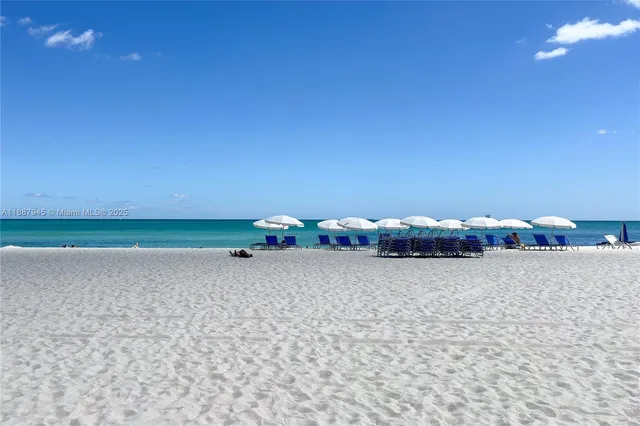 a view of a street with a yard
