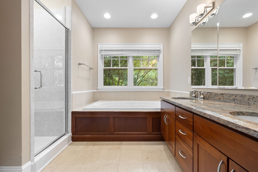 20 Hamlet Street, Unit 1 Newton, MA 02459 - Photo 31 of 41 a bathroom with a tub a sink and a large window