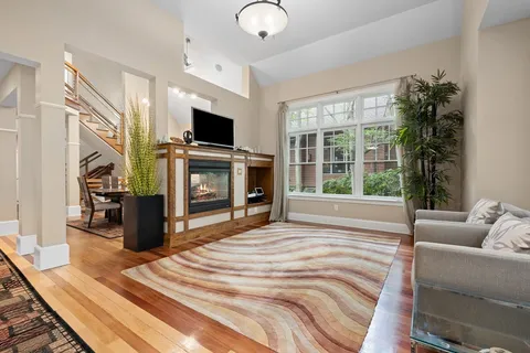 a view of a living room and a flat screen tv