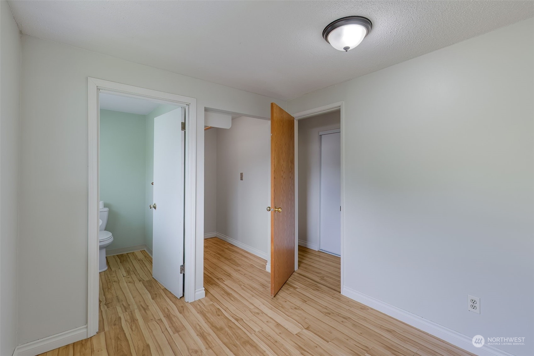 805 8th Avenue Longview, WA 98632 - Photo 14 of 32 a view of hallway with wooden floor