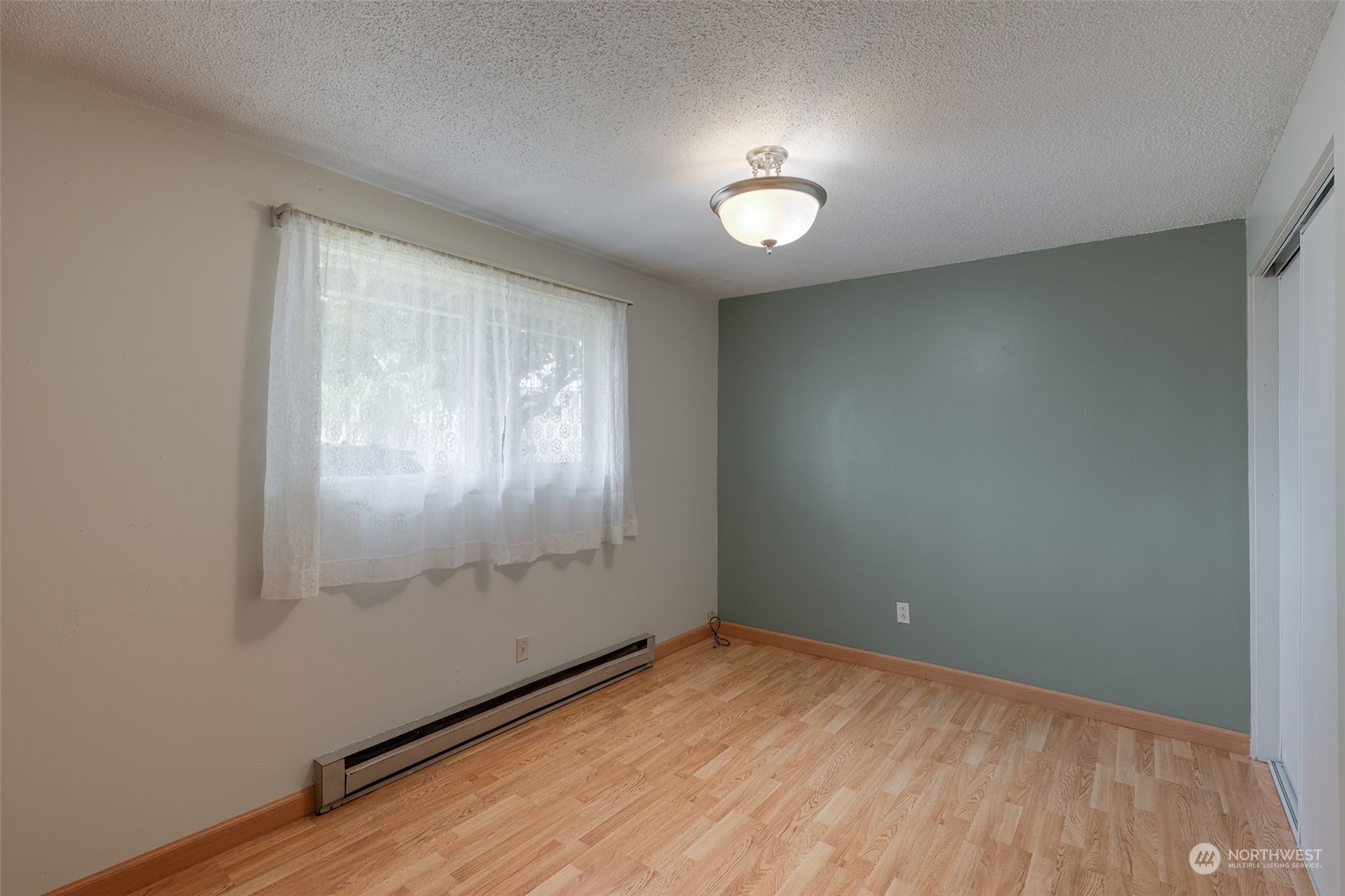 805 8th Avenue Longview, WA 98632 - Photo 18 of 32 an empty room with windows