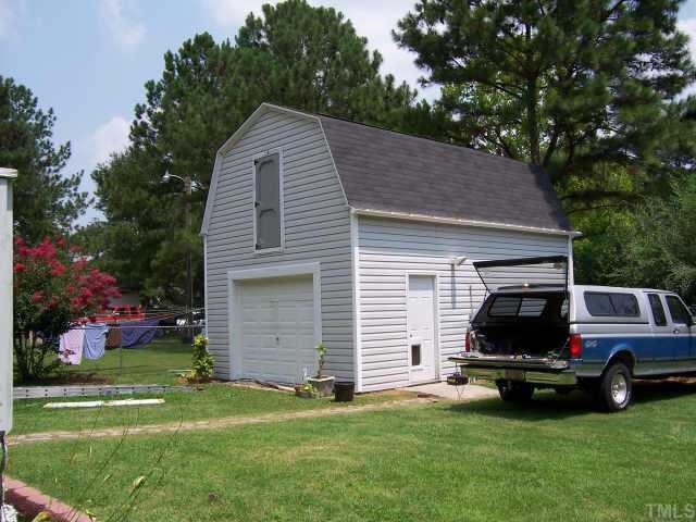 110 Old Farm Road Smithfield, NC 27577 - Photo 5 of 10 Another view of backyard and huge 2 story detached garage