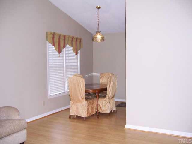 110 Old Farm Road Smithfield, NC 27577 - Photo 7 of 10 Dining area next to kitchen for ease in serving your great dinners.