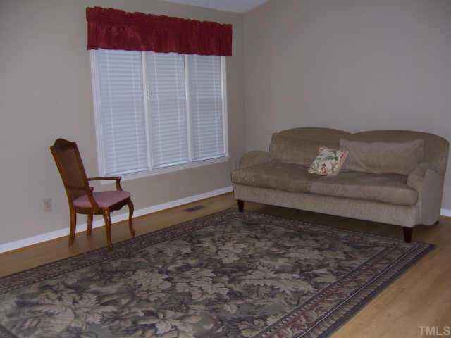 110 Old Farm Road Smithfield, NC 27577 - Photo 8 of 10 Look at this large family room. Vaulted ceiling. Lots of room for those family get togethers