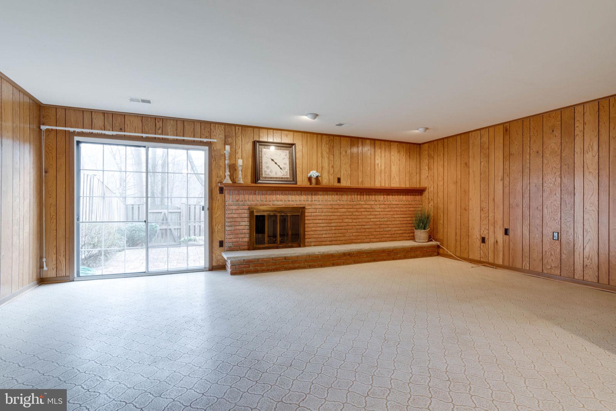 9007 Fox Grape Lane Springfield, VA 22152 - Photo 14 of 23 Expansive rec room on lower level leads to patio.