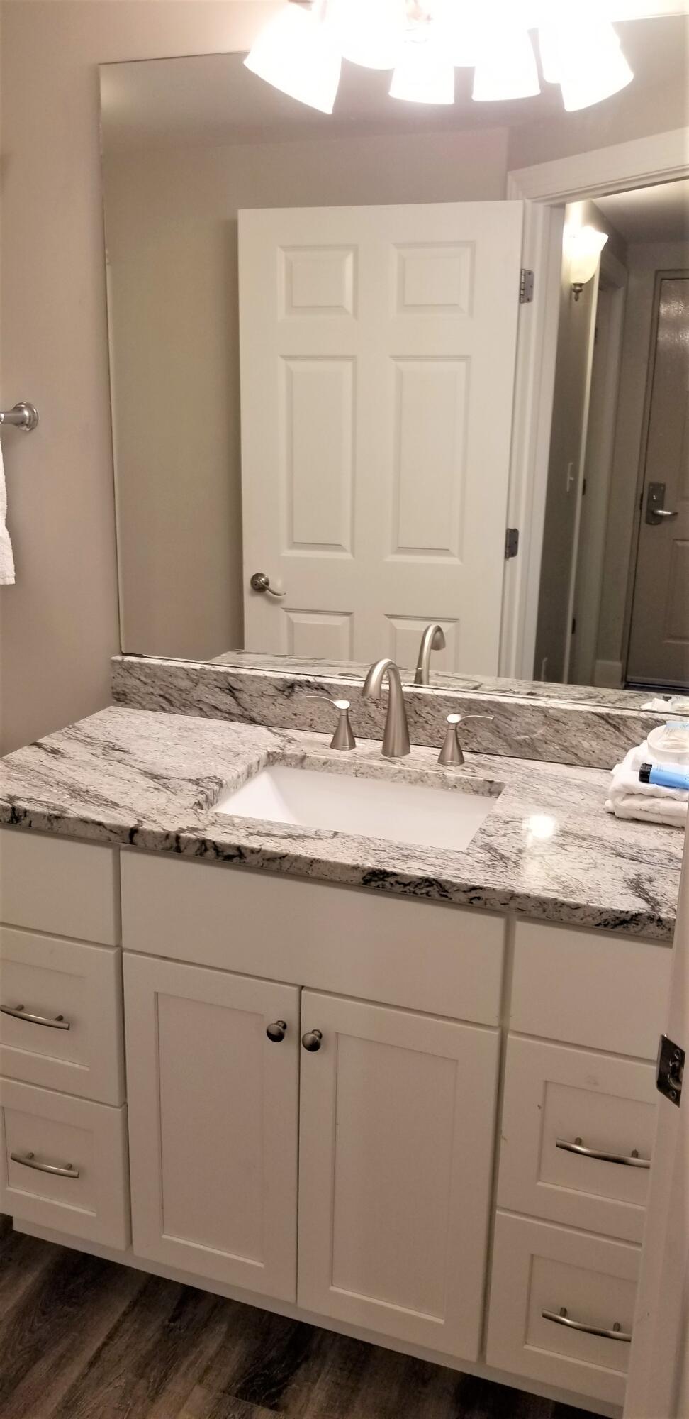 14825 Front Beach Road, Unit 1910 Panama City Beach, FL 32413 - Photo 19 of 39 Guest Bathroom with Granite Vanity Top
