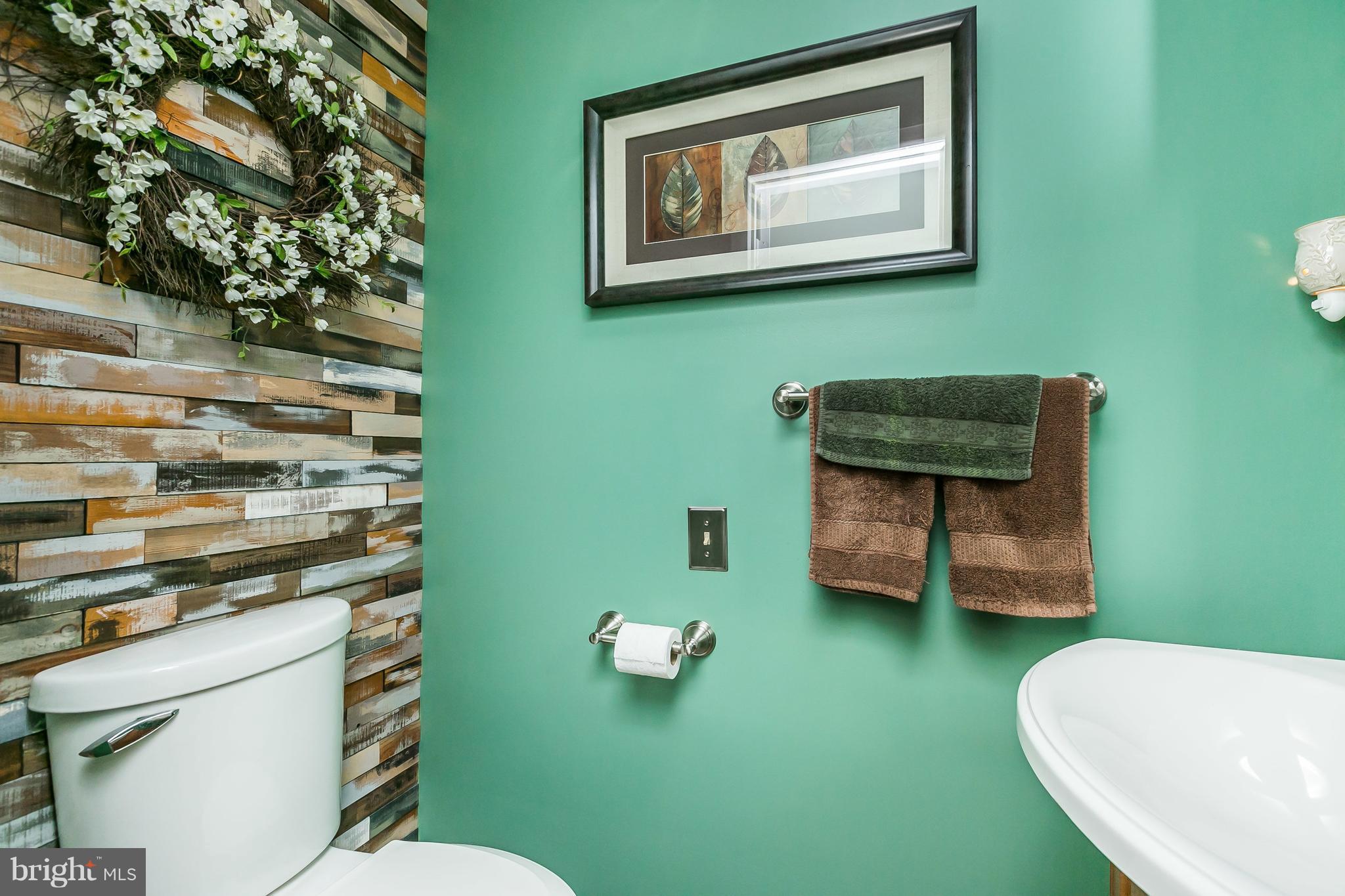 213 Rickswood Road Lutherville-Timonium, MD 21093 - Photo 16 of 28 Half bath with custom wood treatment