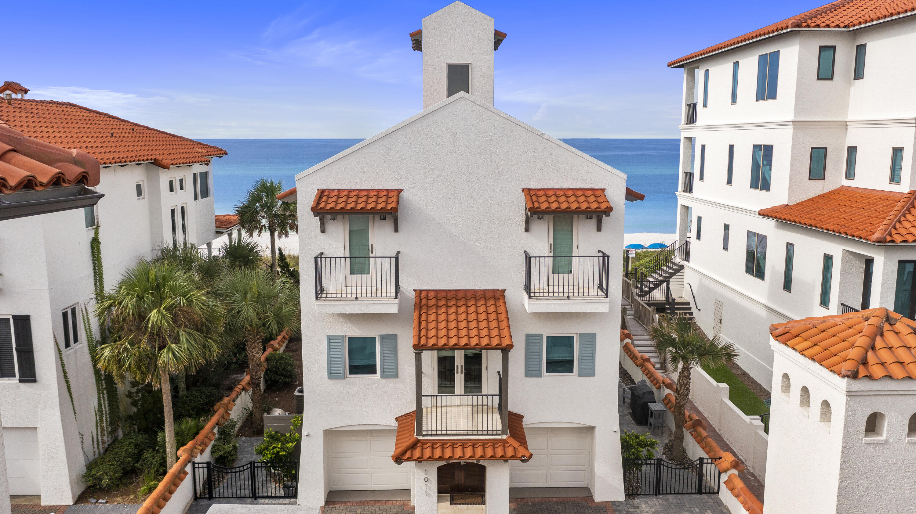 5055 West County Highway 30A, Unit 1011 Santa Rosa Beach, FL 32459 - Photo 1 of 8 a front view of residential houses with stairs