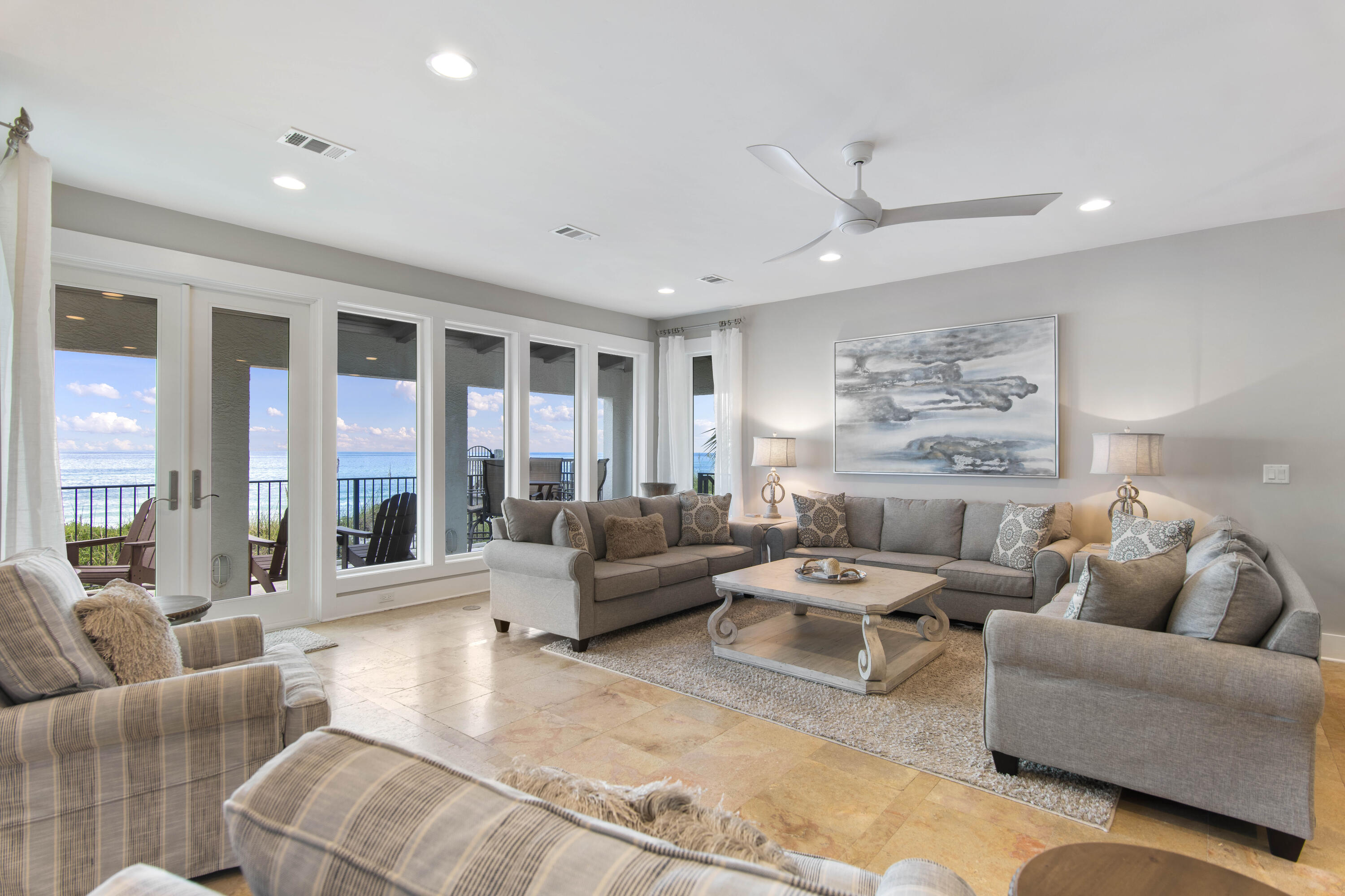 5055 West County Highway 30A, Unit 1011 Santa Rosa Beach, FL 32459 - Photo 2 of 8 a living room with furniture and a large window