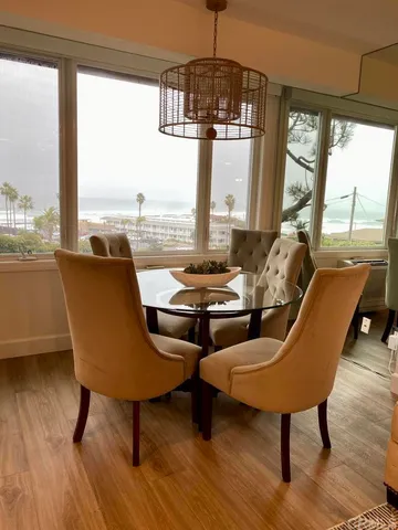 a very nice looking living room with a large window