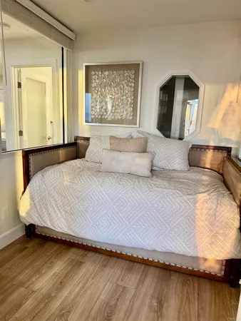 a view of a dining area with furniture and wooden floor