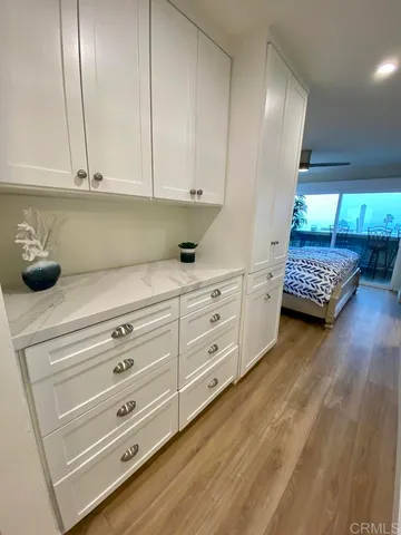 a kitchen with appliances and cabinets