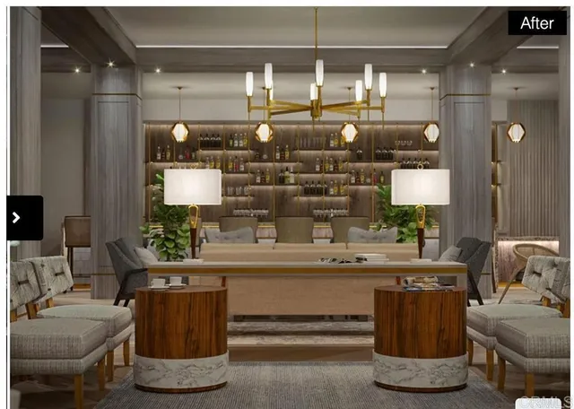 a room with a couch and potted plant