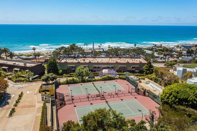 an aerial view of a building with outdoor space