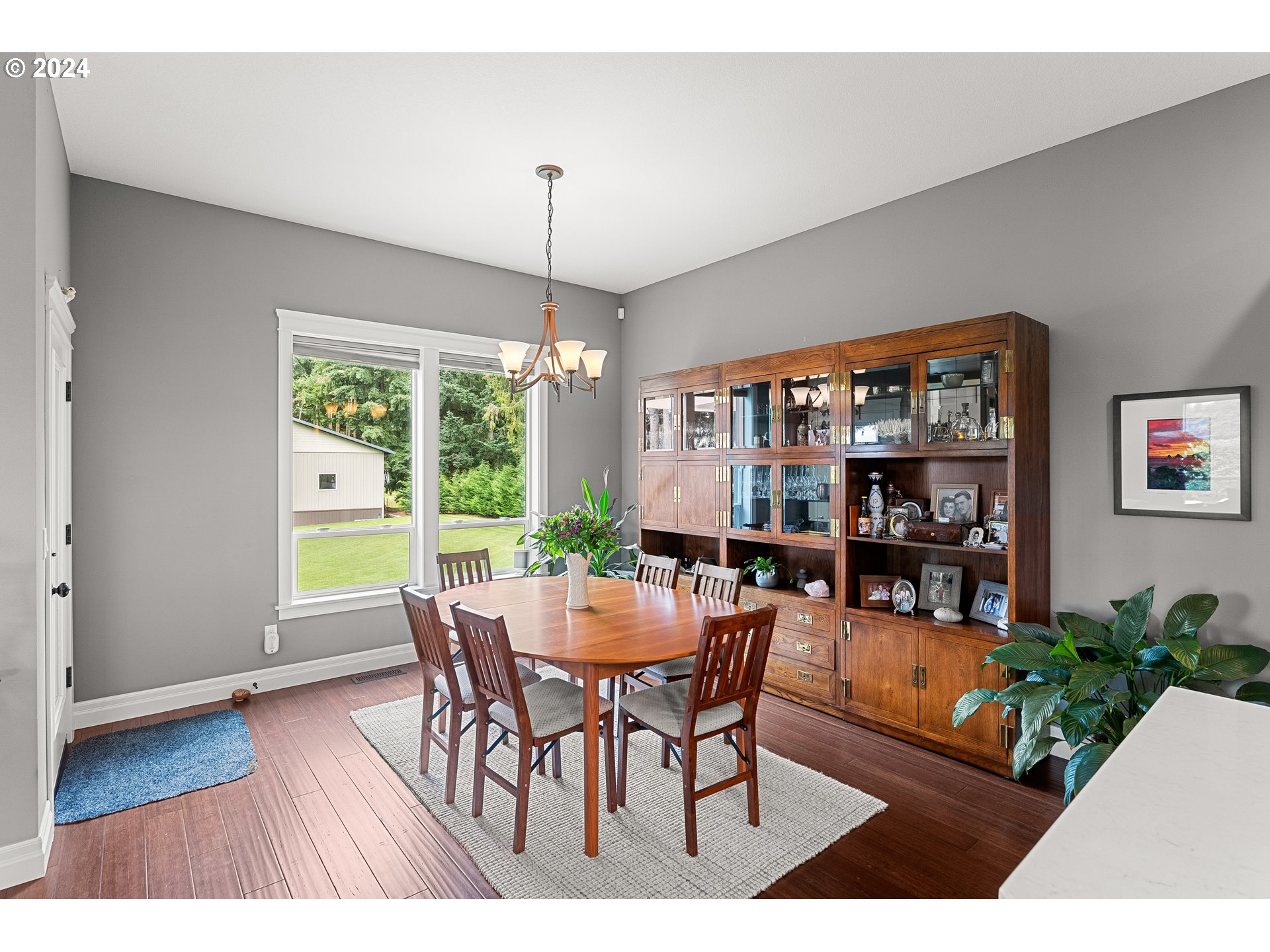 25595 South Rhoten Road Aurora, OR 97002 - Photo 19 of 48 a view of a dining room with furniture window and outside view