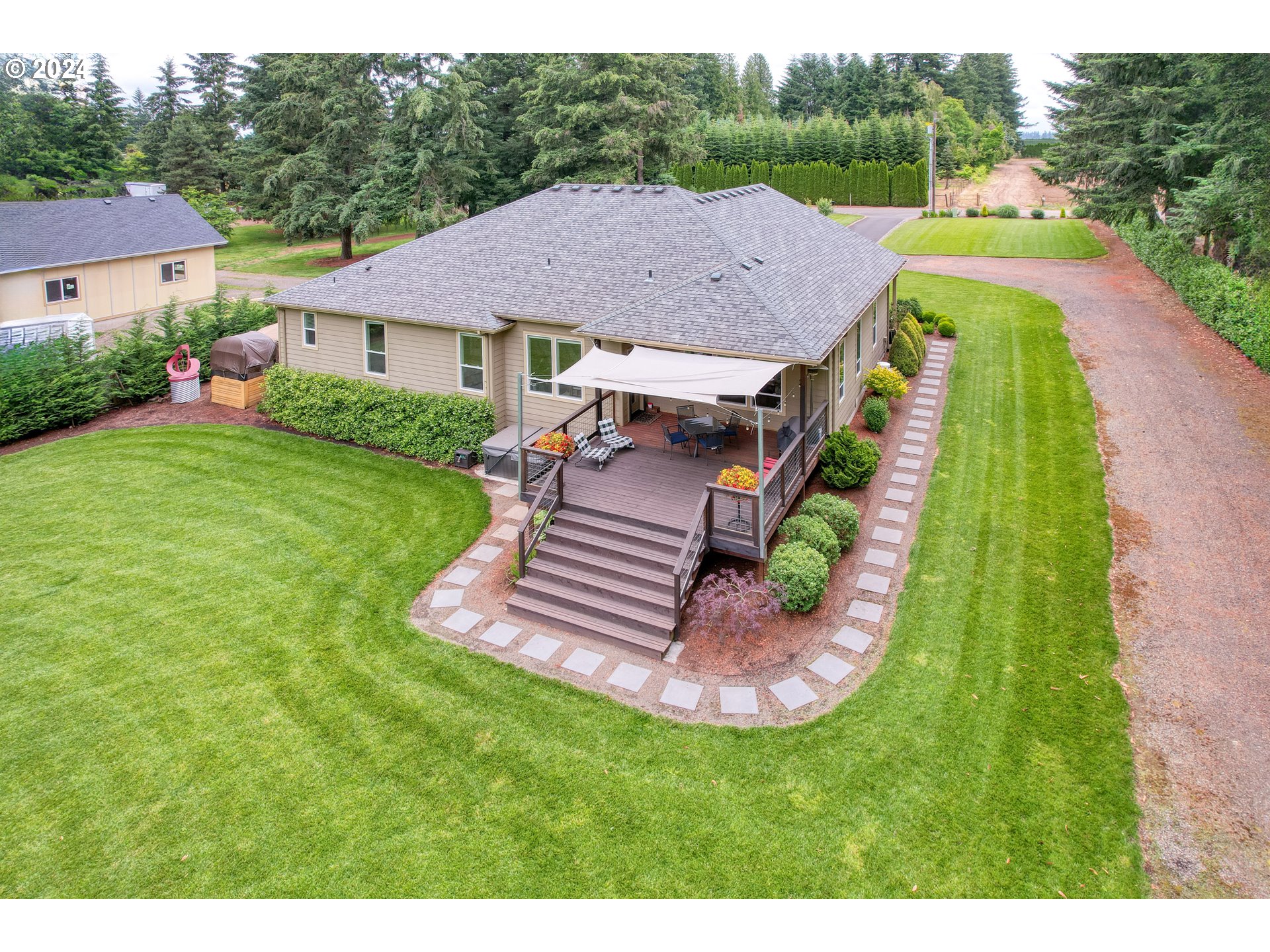 25595 South Rhoten Road Aurora, OR 97002 - Photo 31 of 48 a aerial view of a house with swimming pool and garden