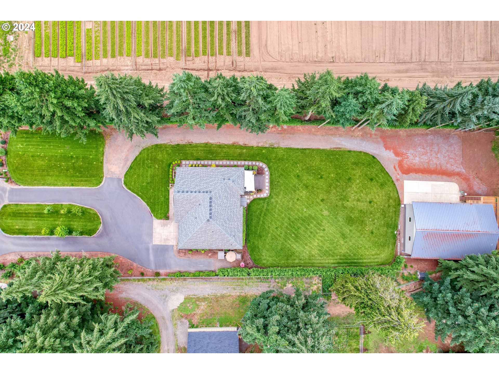 25595 South Rhoten Road Aurora, OR 97002 - Photo 45 of 48 an aerial view of a house
