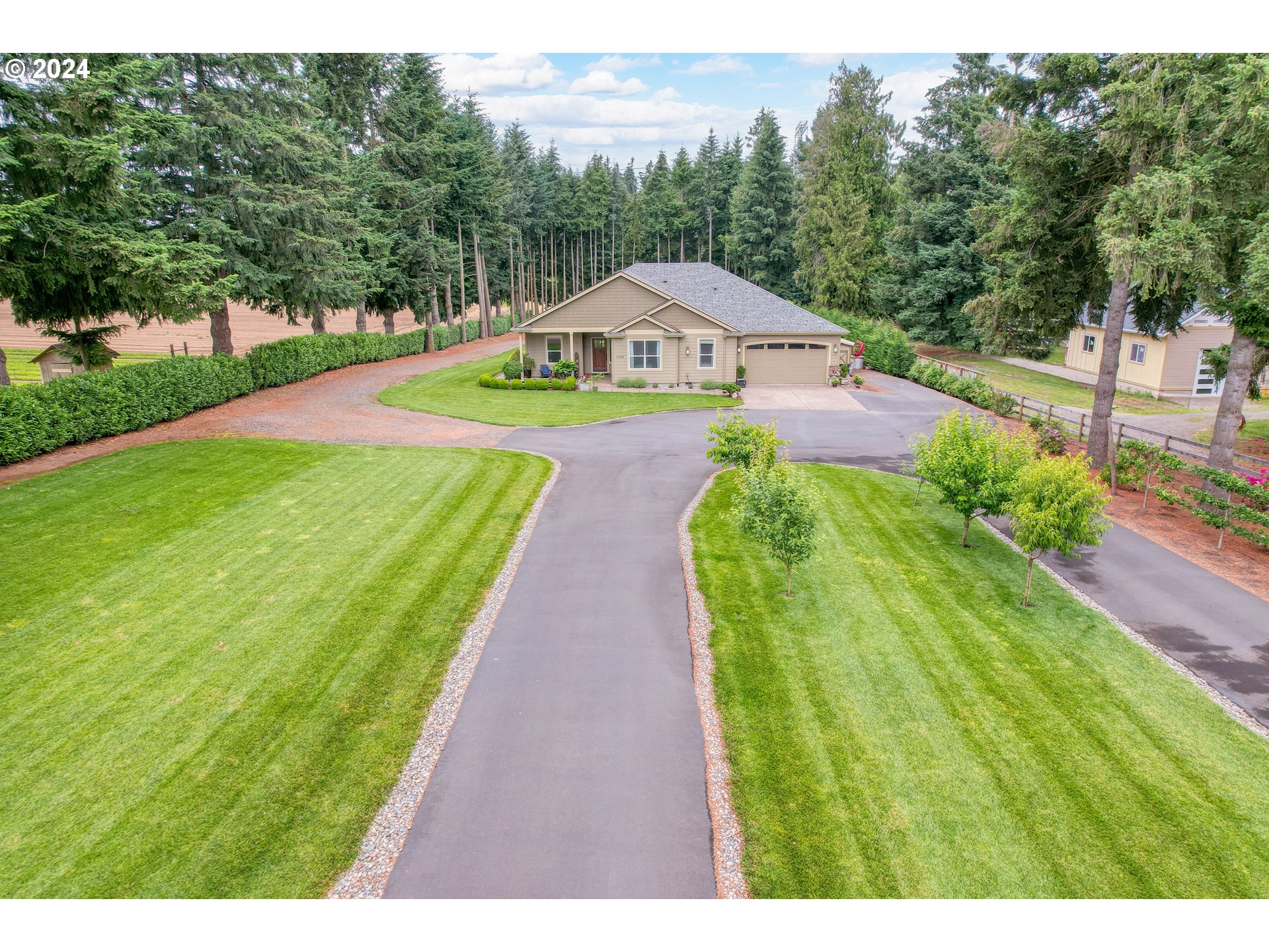 25595 South Rhoten Road Aurora, OR 97002 - Photo 47 of 48 a view of a house with a yard