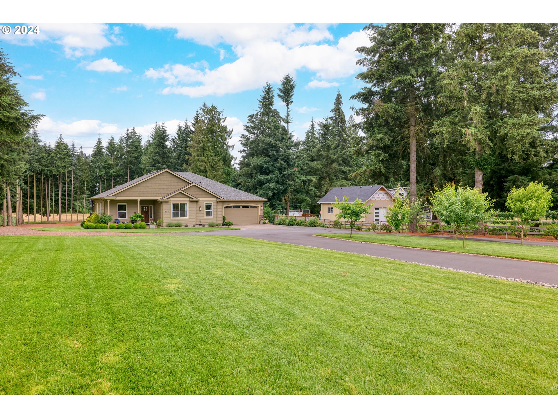 25595 South Rhoten Road Aurora, OR 97002 - Photo 6 of 48 a view of a house with a yard
