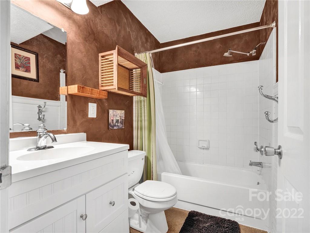 11060 Running Ridge Road Charlotte, NC 28226 - Photo 12 of 16 a bathroom with a sink a toilet and shower