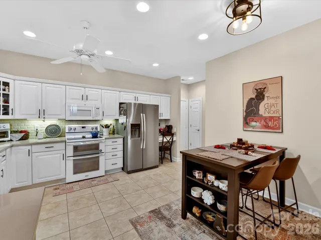 a room with furniture and a book shelf