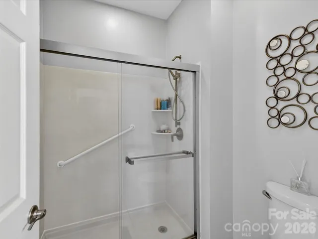 a bedroom with a bed furniture and a window