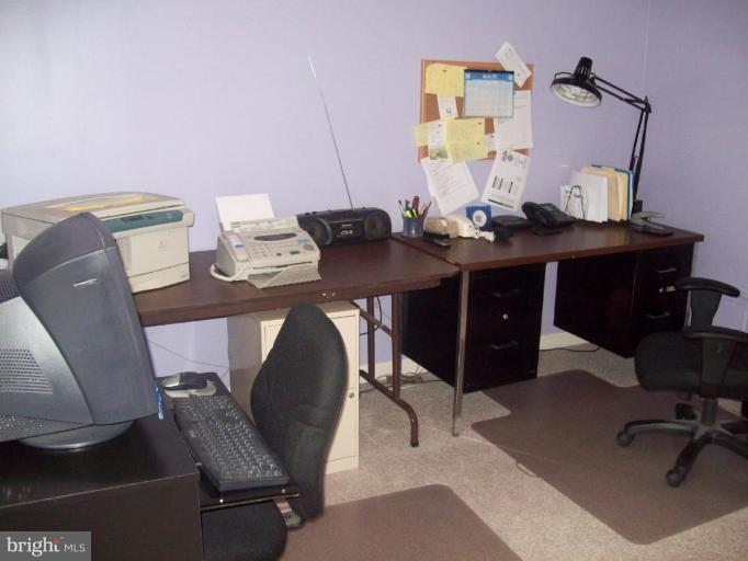 603 Pasture Brook Road Severn, MD 21144 - Photo 18 of 22 a view of a workspace with furniture