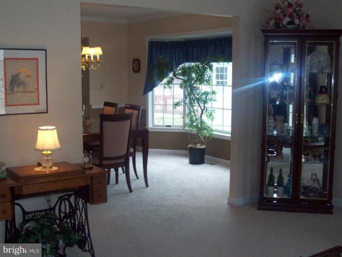 603 Pasture Brook Road Severn, MD 21144 - Photo 4 of 22 a view of a livingroom with furniture and a window