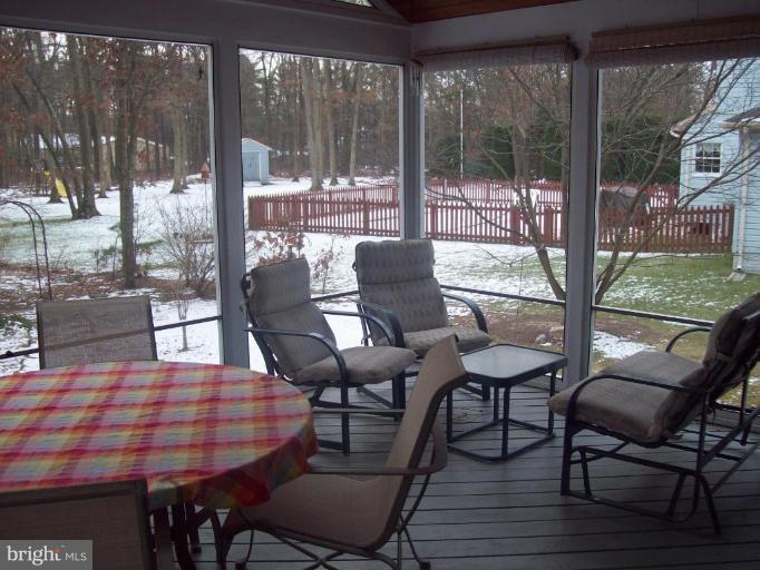 603 Pasture Brook Road Severn, MD 21144 - Photo 10 of 22 a view of a dining room with furniture and window