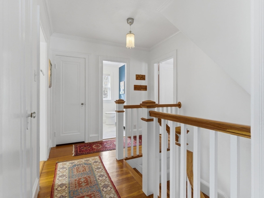 24 Blake Road Brookline, MA 02445 - Photo 18 of 40 a view of a hallway with a white walls