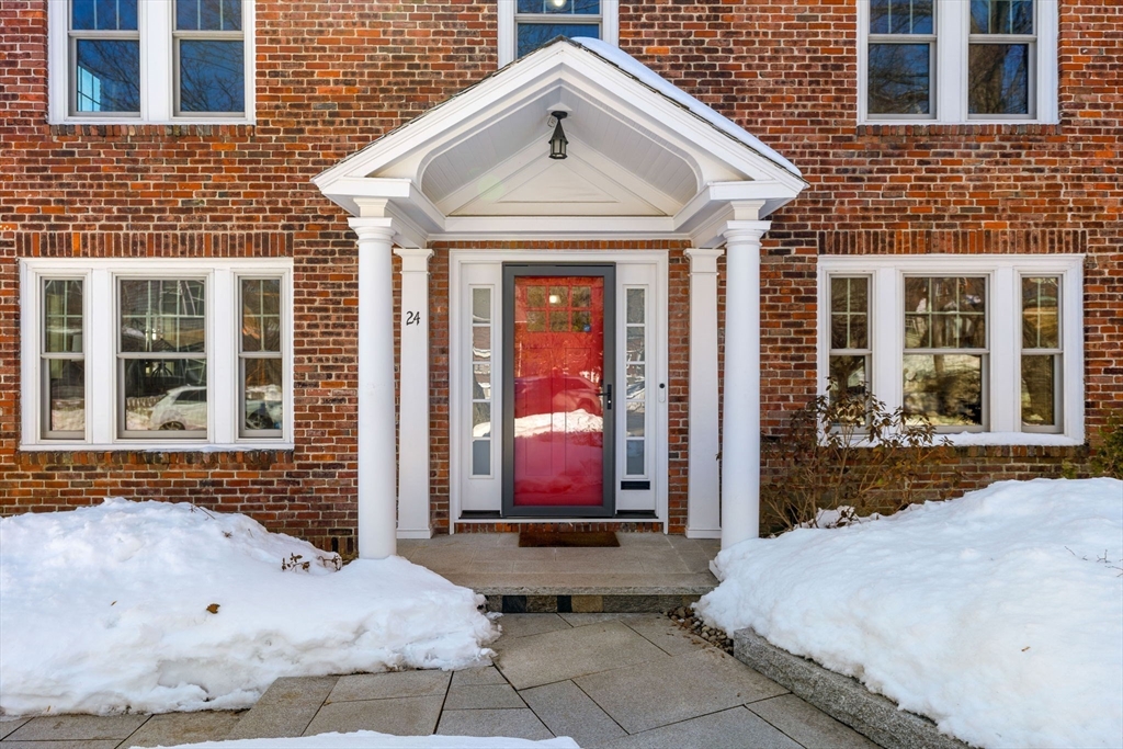 24 Blake Road Brookline, MA 02445 - Photo 2 of 40 a view of a brick house with large windows
