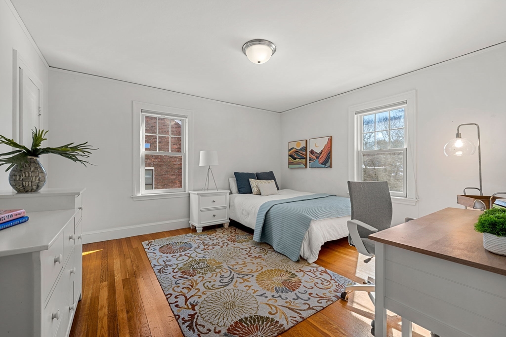 24 Blake Road Brookline, MA 02445 - Photo 25 of 40 a bedroom with a bed and a window
