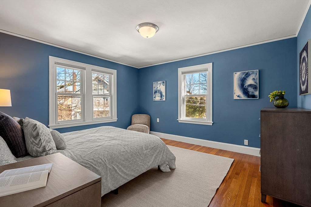 24 Blake Road Brookline, MA 02445 - Photo 27 of 40 a bedroom with a bed and a window
