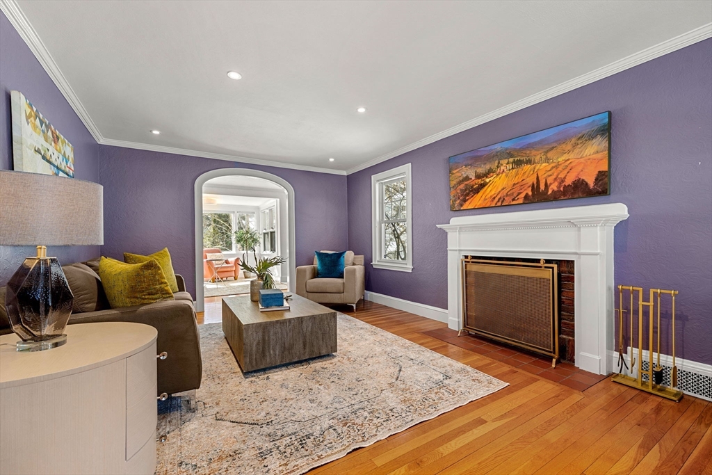 24 Blake Road Brookline, MA 02445 - Photo 5 of 40 a living room with furniture and a fireplace
