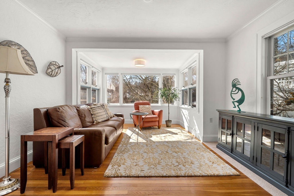24 Blake Road Brookline, MA 02445 - Photo 7 of 40 a living room with furniture and a table