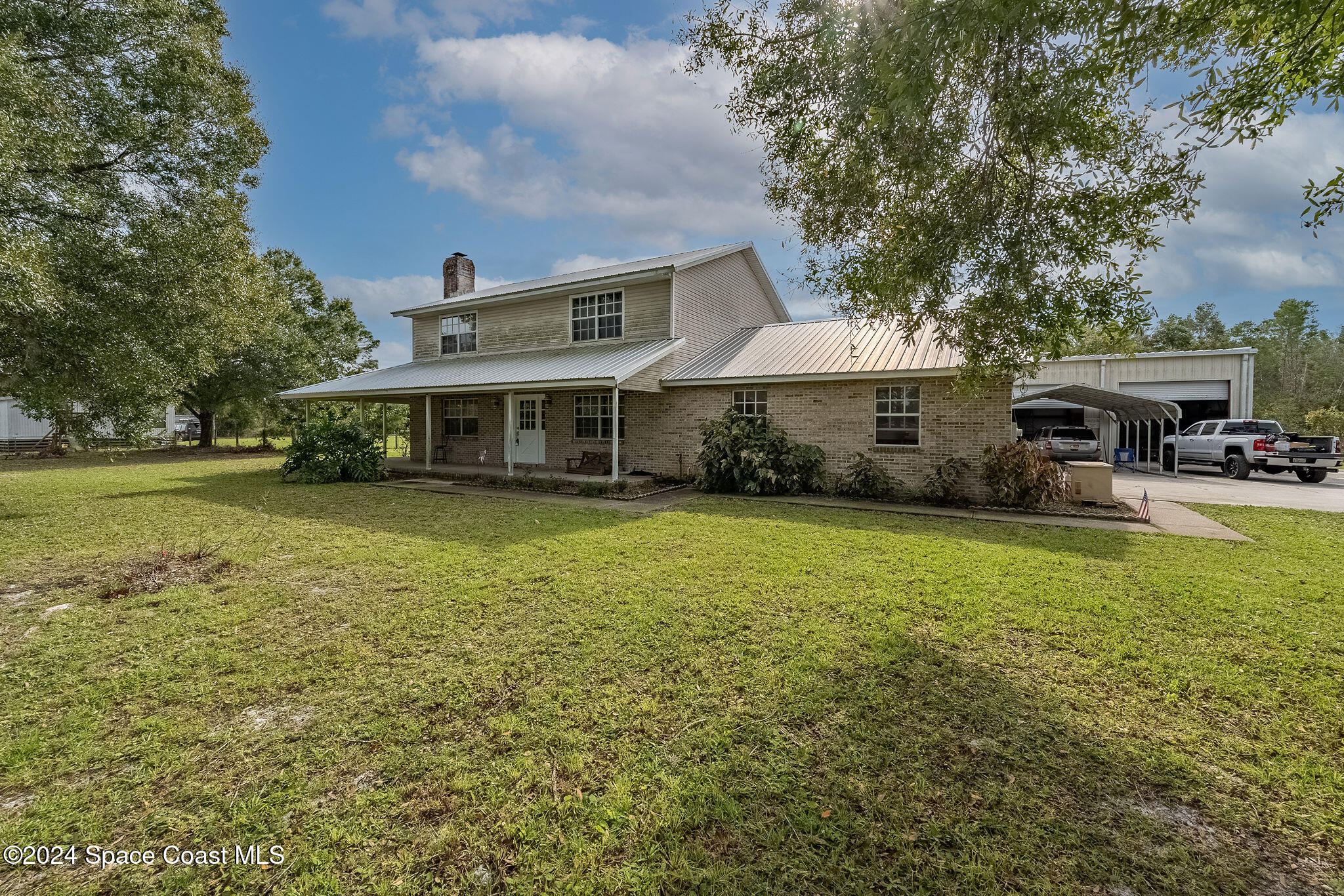 5095 Gandy Road Mims, FL 32754 - Photo 1 of 58 Front of Home
