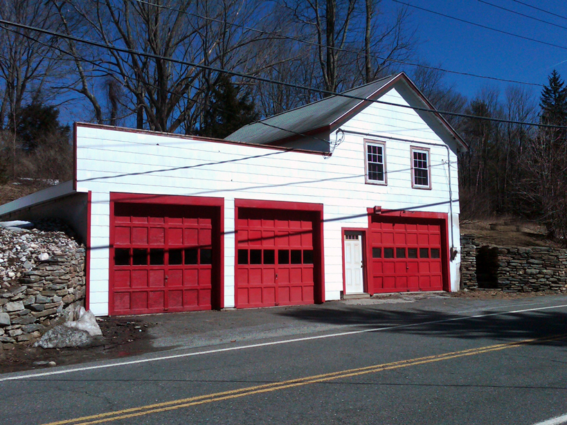 465 Main Road Monterey, MA 01245 - Photo 1 of 6 a view of a house with a yard