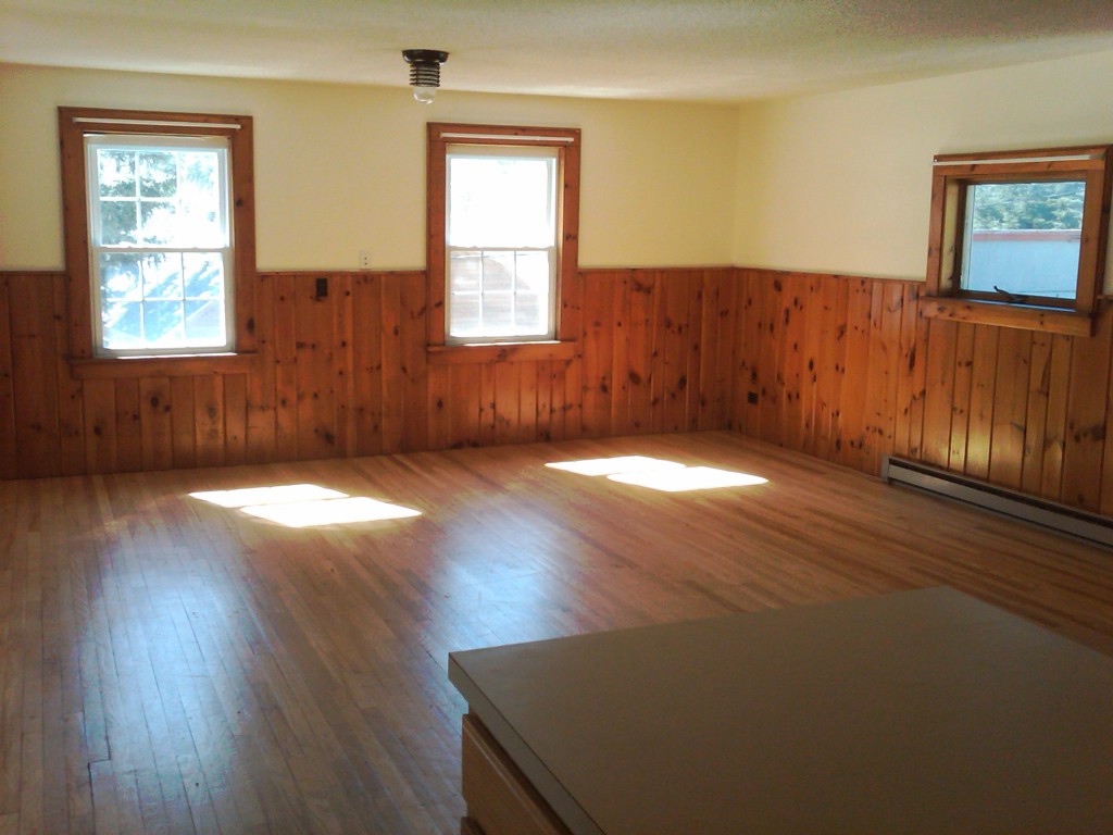465 Main Road Monterey, MA 01245 - Photo 4 of 6 an empty room with wooden floor and windows