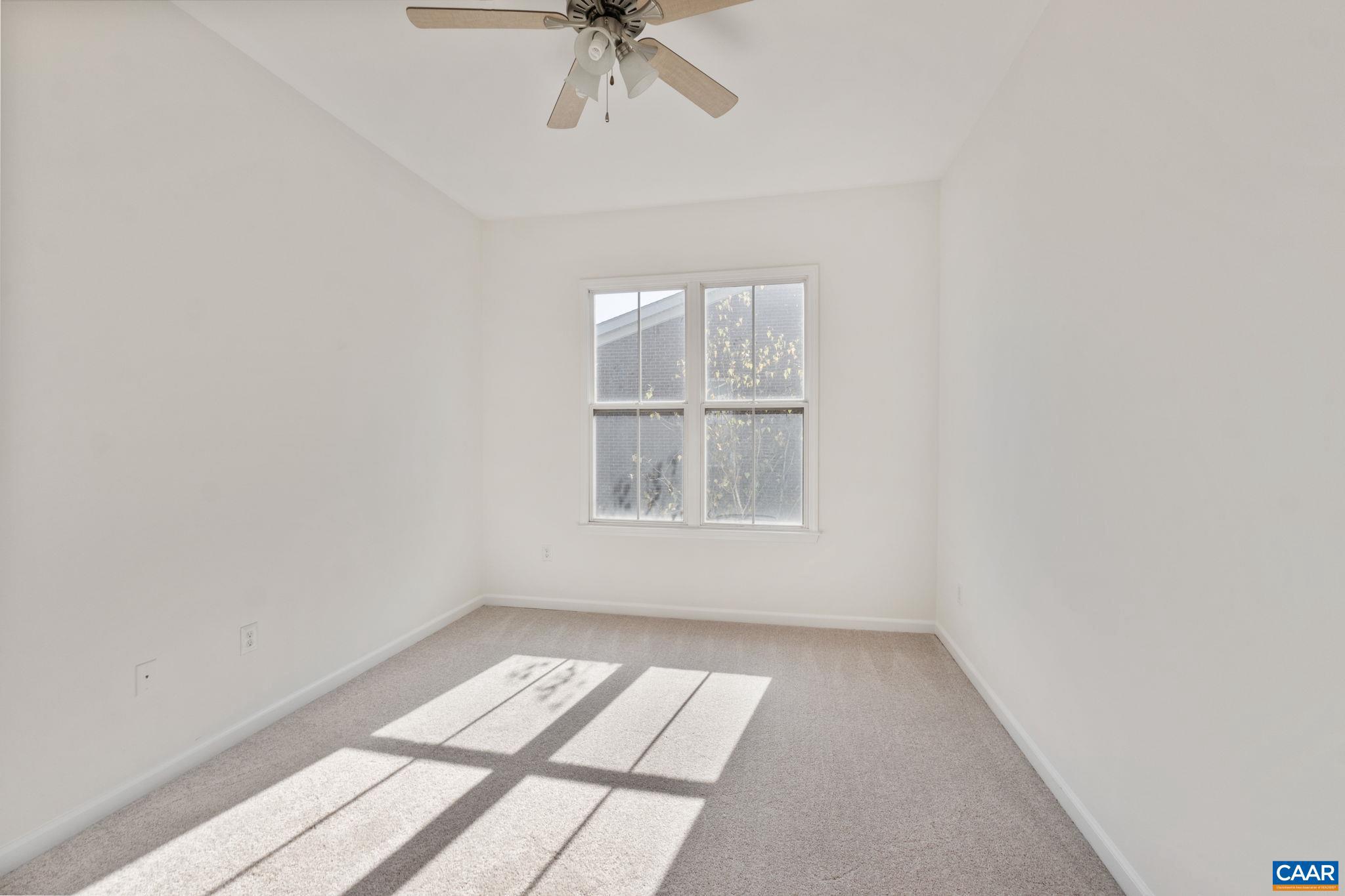 765 Walker Square, Unit 4B Charlottesville, VA 22903 - Photo 11 of 17 an empty room with a window