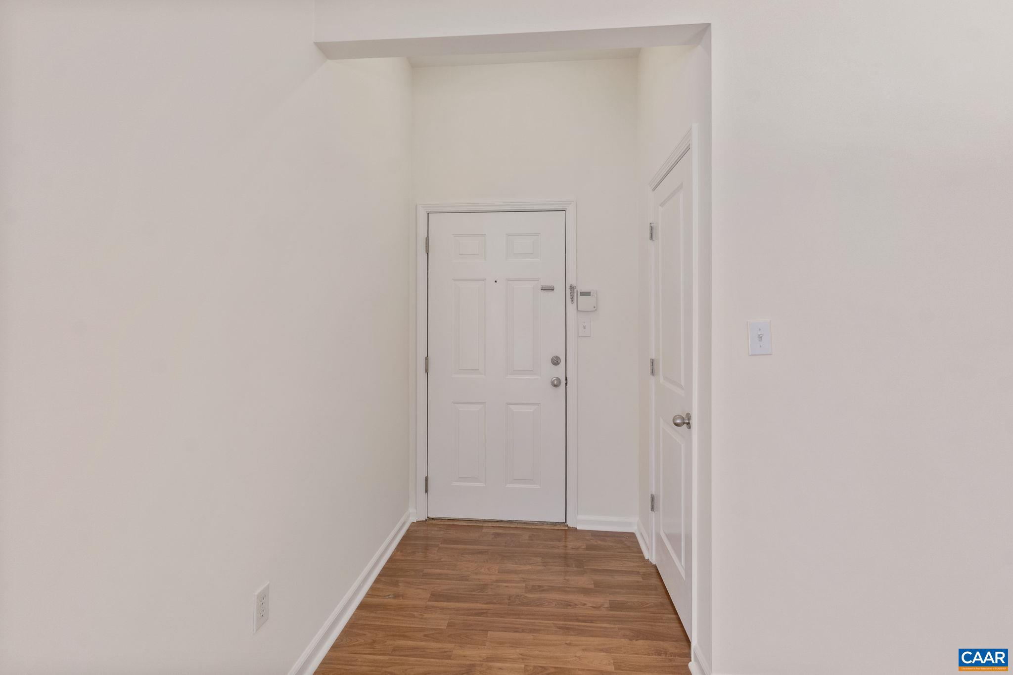 765 Walker Square, Unit 4B Charlottesville, VA 22903 - Photo 3 of 17 a view of a hallway