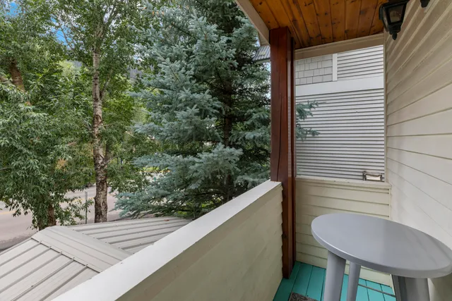 a bedroom with a bed and dresser