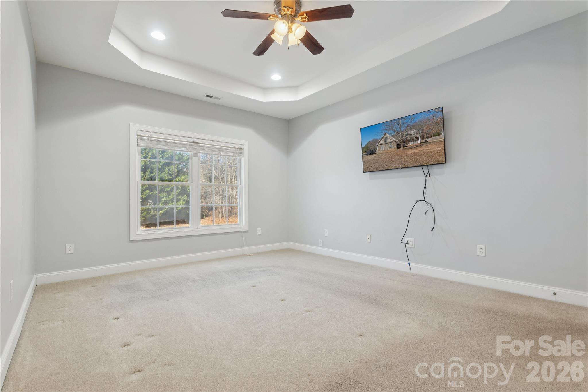 1308 Kerrington Way Clover, SC 29710 - Photo 16 of 33 an empty room with windows and fan