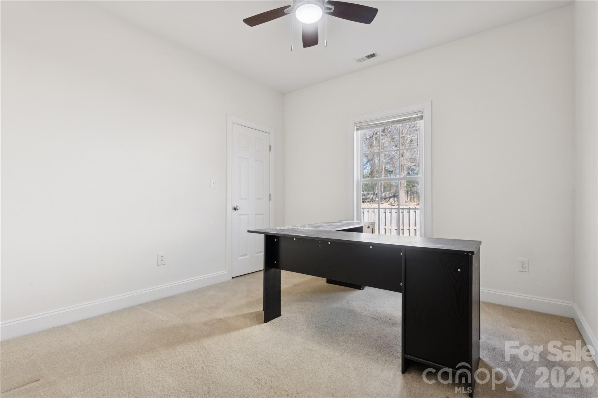 1308 Kerrington Way Clover, SC 29710 - Photo 21 of 33 a room with a table and a window