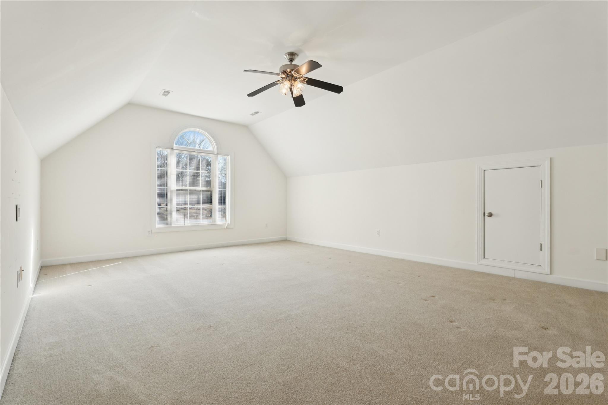 1308 Kerrington Way Clover, SC 29710 - Photo 32 of 33 an empty room with windows and ceiling fan