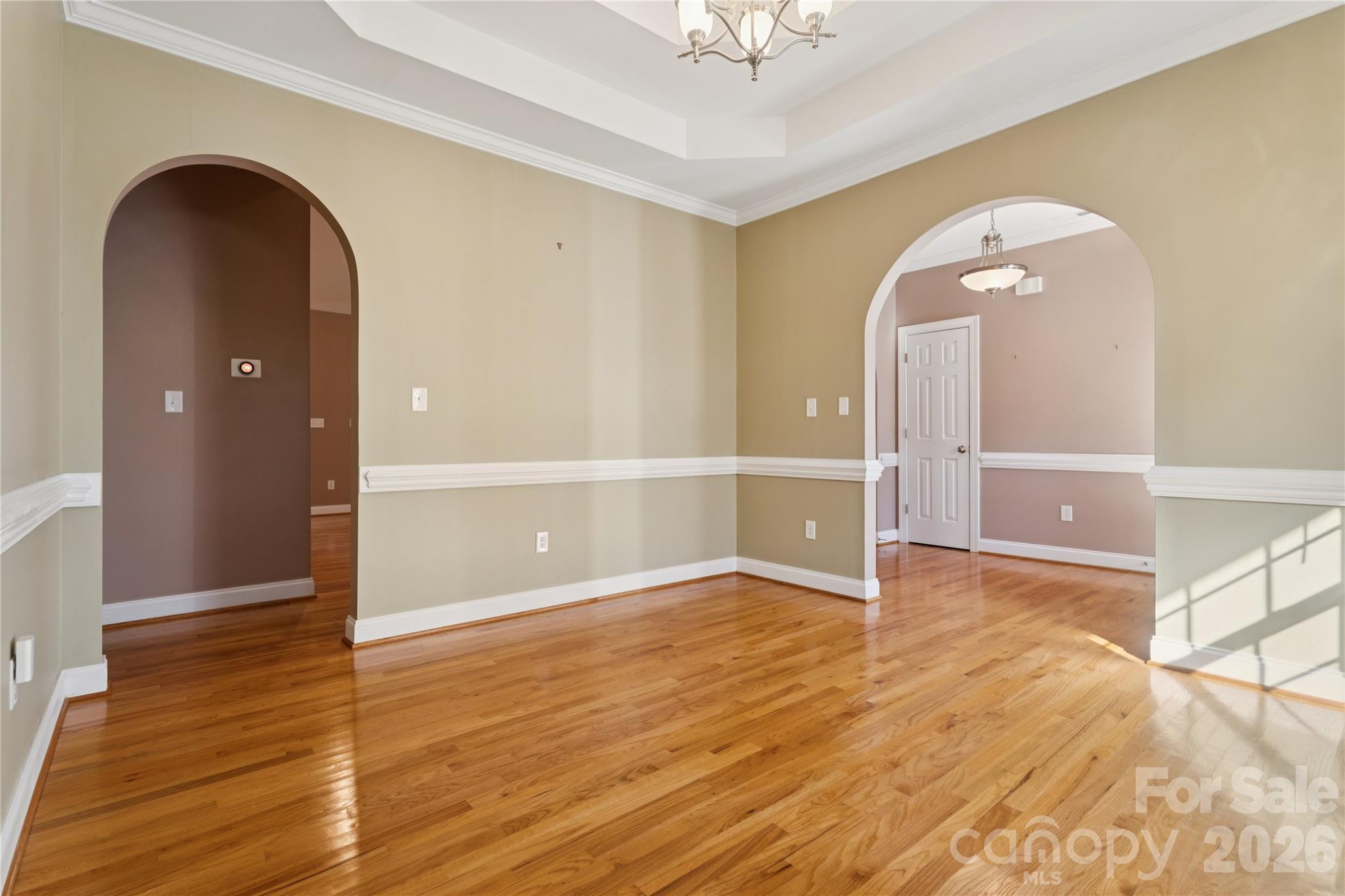 1308 Kerrington Way Clover, SC 29710 - Photo 4 of 33 wooden floor in an empty room with a window