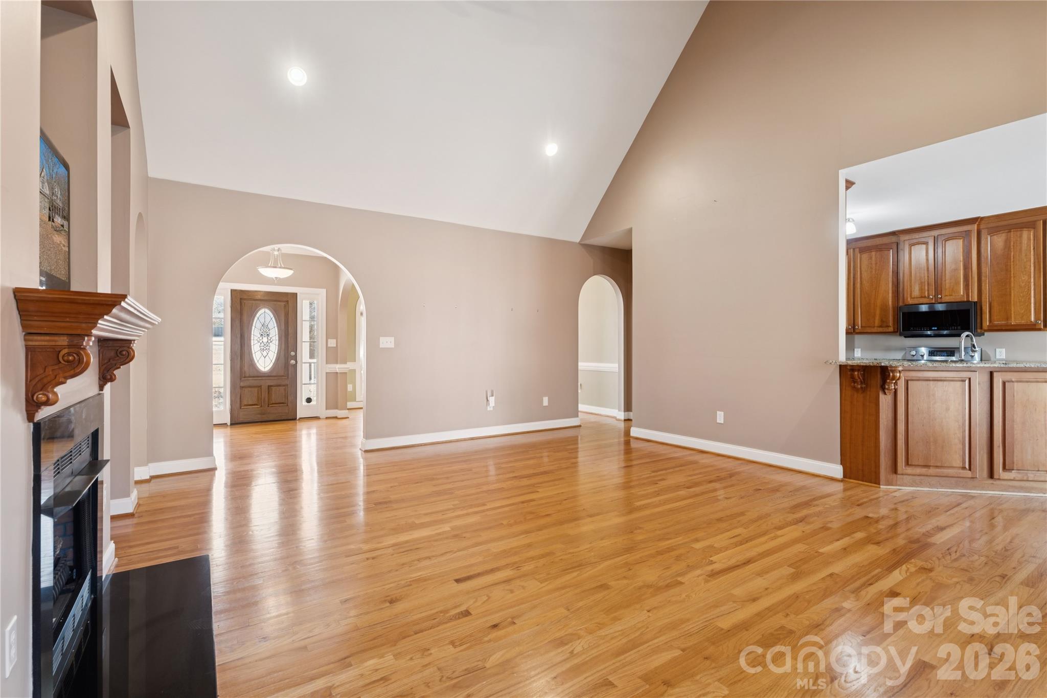 1308 Kerrington Way Clover, SC 29710 - Photo 10 of 33 a view of a kitchen with furniture and wooden floor