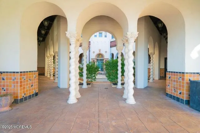 a view of an entryway door with a living room