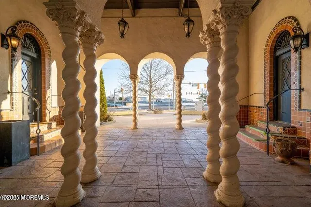 a view of lobby with mirror