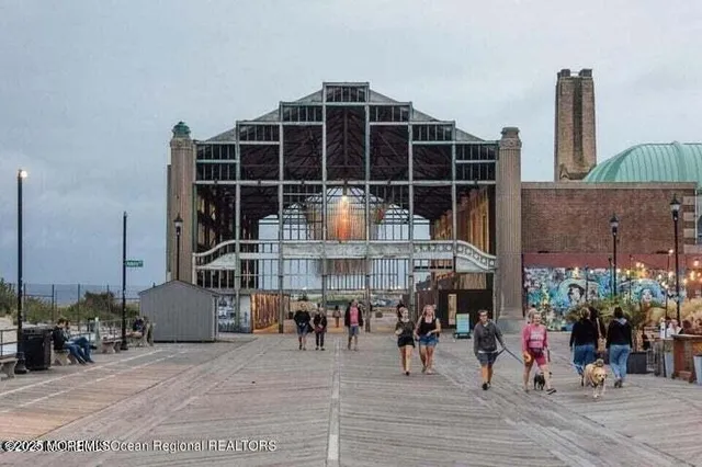 a front view of a building with glass windows