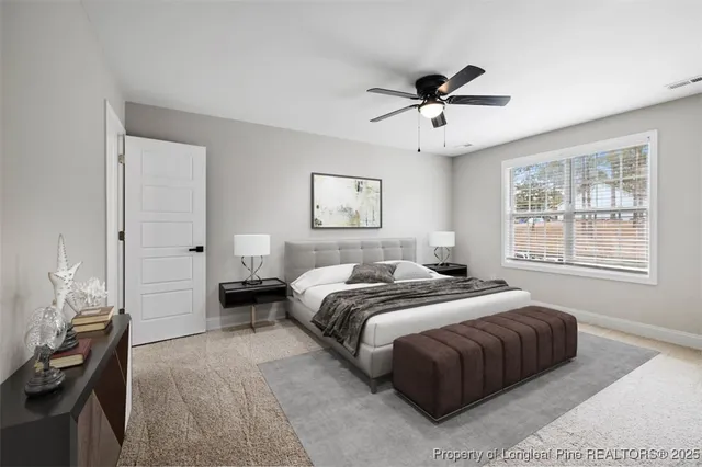 a bed room with a bed and a chandelier